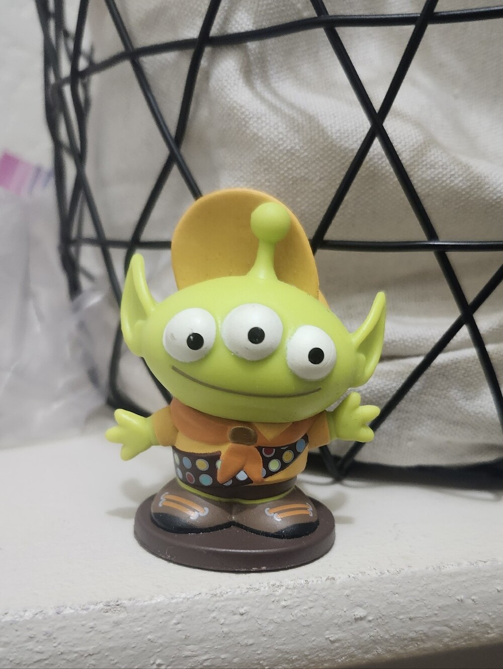Disney Three-Eyed Alien Figure in Green and Yellow Outfit